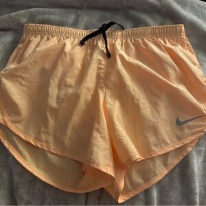 Nike Women's Light Orange Athletic Shorts